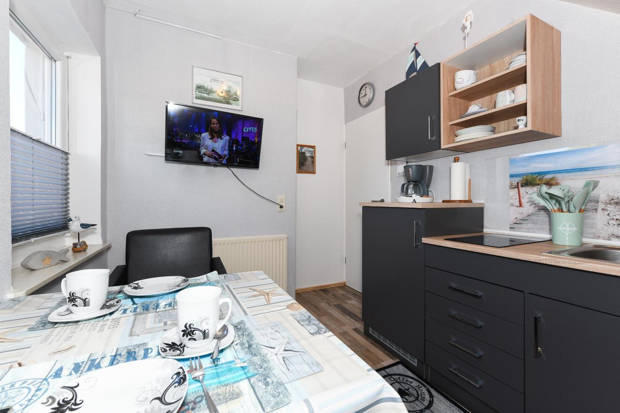 Ferienwohnung Ankerplatz Im Gaestehaus Kock Neuharlingersiel Buitenkant foto